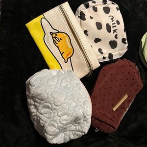 4 makeup / mini bags